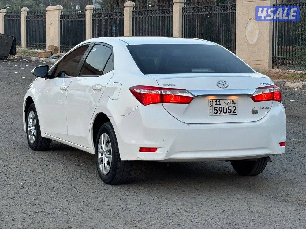 للبيع كورولا 2015 ممشى ٦٠ الف2