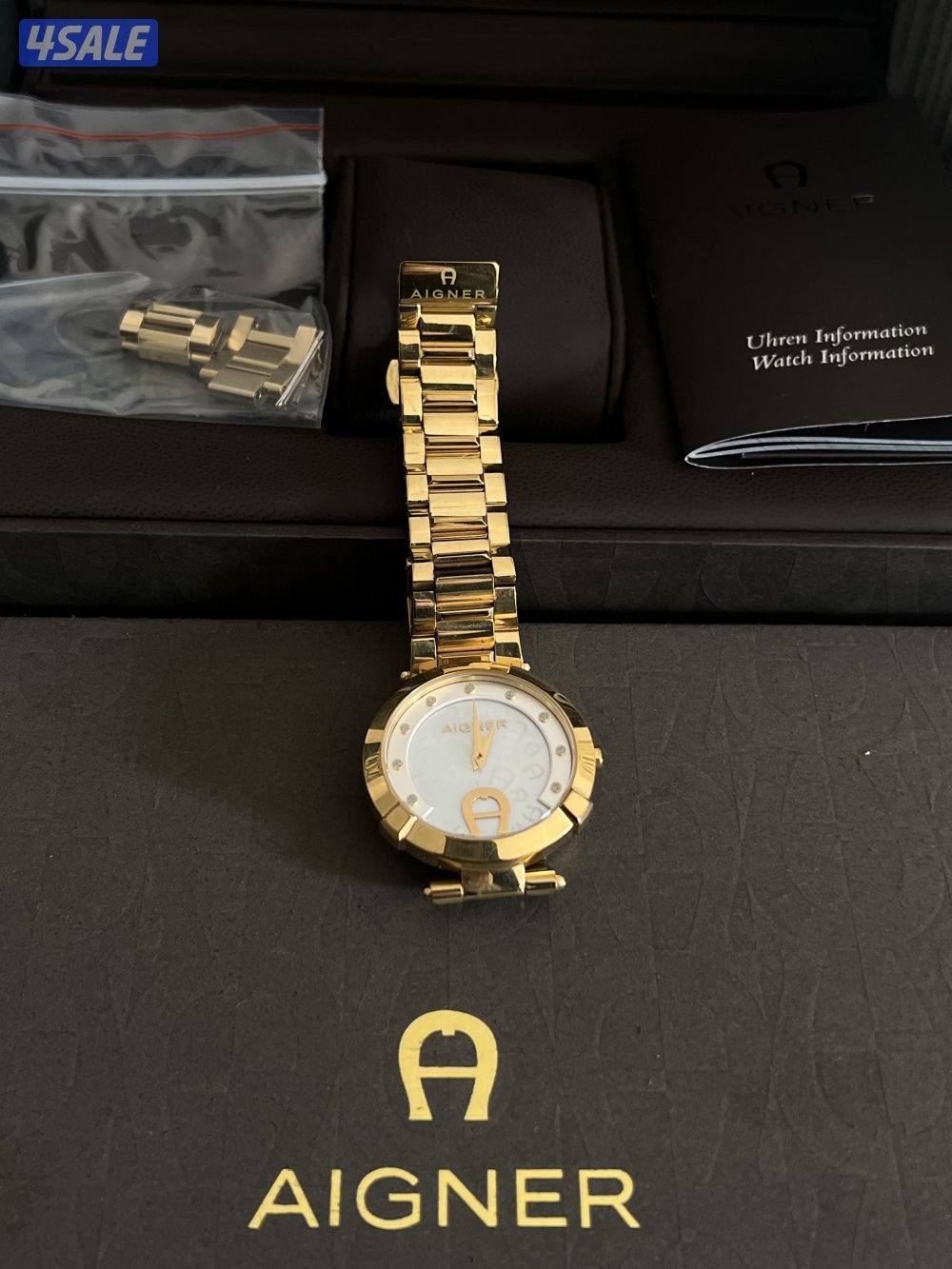 ساعه نسائيه ماركة (أغنر) الاصليه كامله بجميع مرفقاتها.0