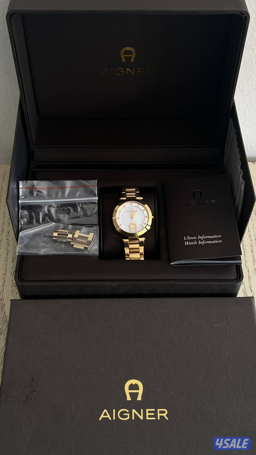 ساعه نسائيه ماركة (أغنر) الاصليه كامله بجميع مرفقاتها.2