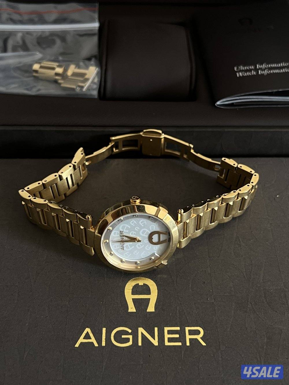 ساعه نسائيه ماركة (أغنر) الاصليه كامله بجميع مرفقاتها.3