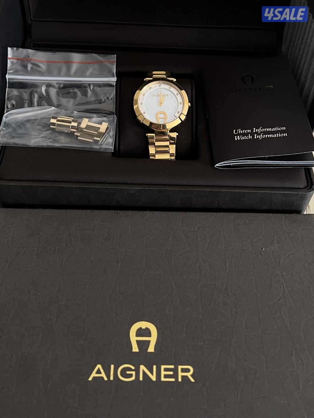 ساعه نسائيه ماركة (أغنر) الاصليه كامله بجميع مرفقاتها.5