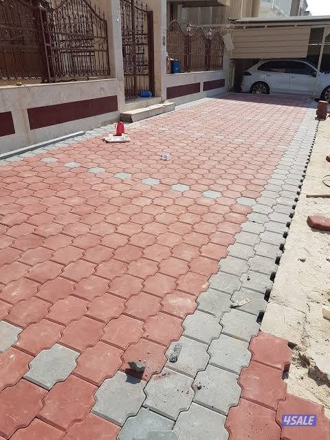 معلم بلاط متداخل وتنسيق حدائق1