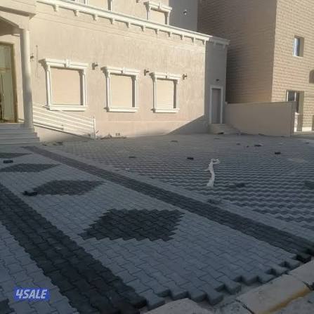 تركيب بلاط متداخل وتنسيق حدائق4