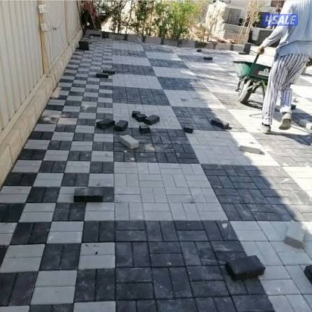 تركيب بلاط متداخل وتنسيق حدائق11