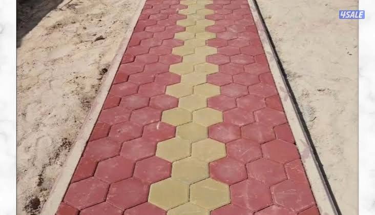 معلم بلاط متداخل وتنسيق حدائق0