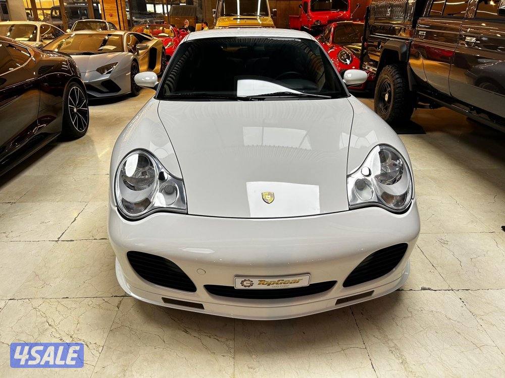 الري بجانب النصر الرياضي توب جير للسيارات1