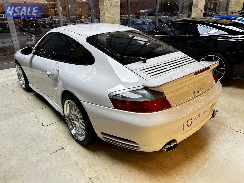 الري بجانب النصر الرياضي توب جير للسيارات9