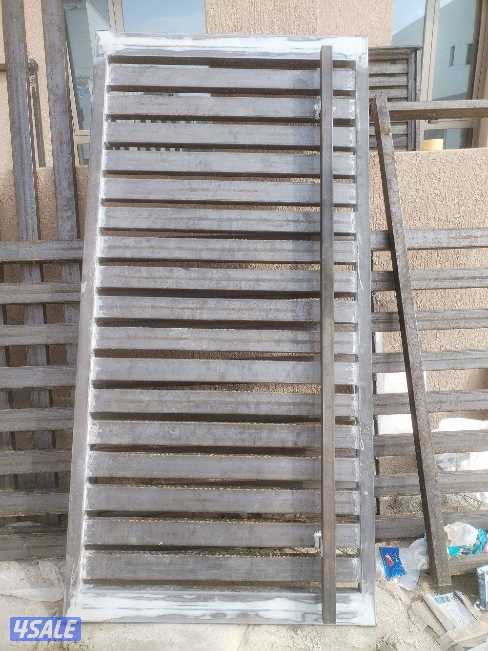 حداد مظلات وابواب وشبرات ومخازن وسلالم وكل ما يخص اعمال9