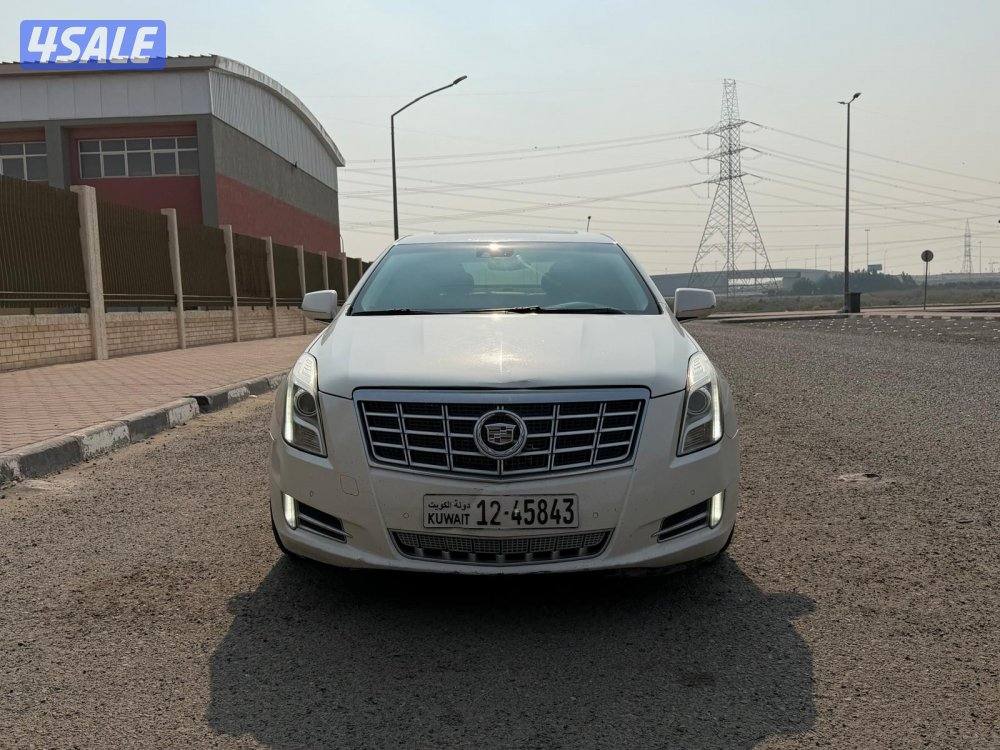 بيعه سريعه للبيع كاديلاك XTSموديل 2013 شرط الفحص ماشي ٢٢٠0