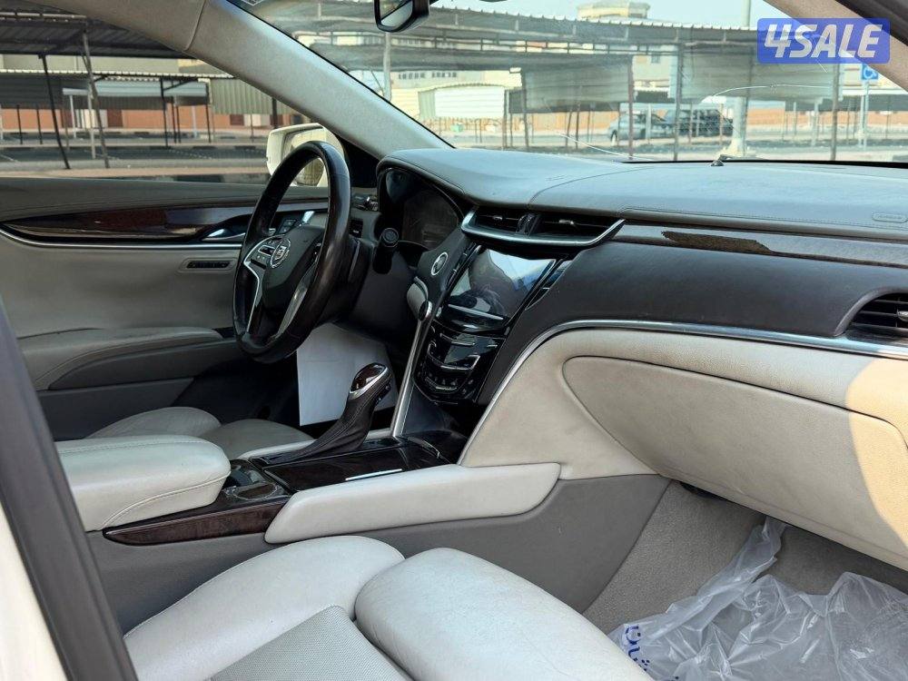 بيعه سريعه للبيع كاديلاك XTSموديل 2013 شرط الفحص ماشي ٢٢٠1