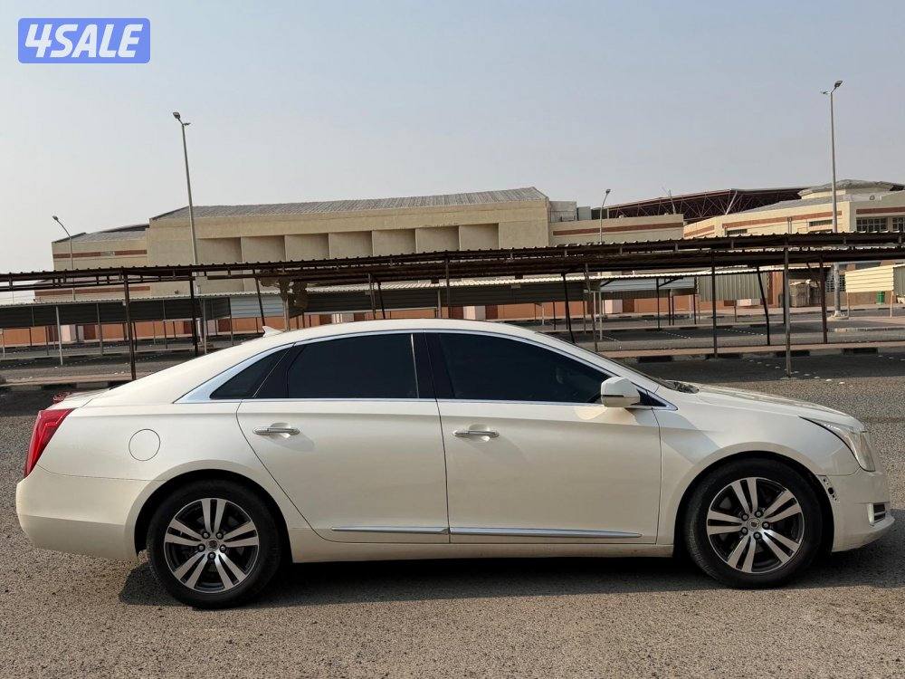 بيعه سريعه للبيع كاديلاك XTSموديل 2013 شرط الفحص ماشي ٢٢٠5