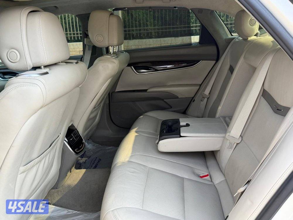 بيعه سريعه للبيع كاديلاك XTSموديل 2013 شرط الفحص ماشي ٢٢٠8