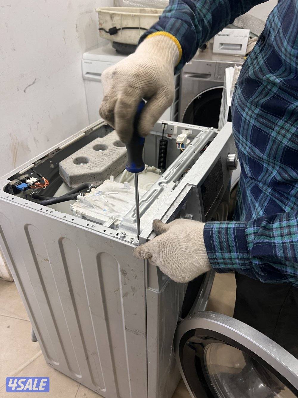 تصليح غسالة ونشافة مع ضمان فني باكستاني خدمة ٢٤/٧5