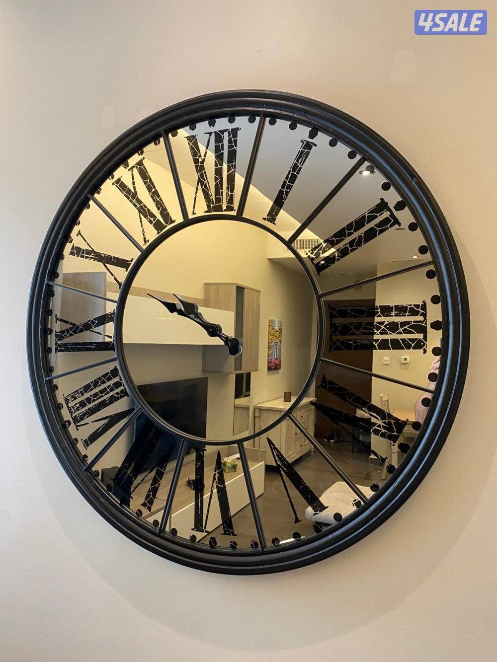 mirror clock + picture + plant0