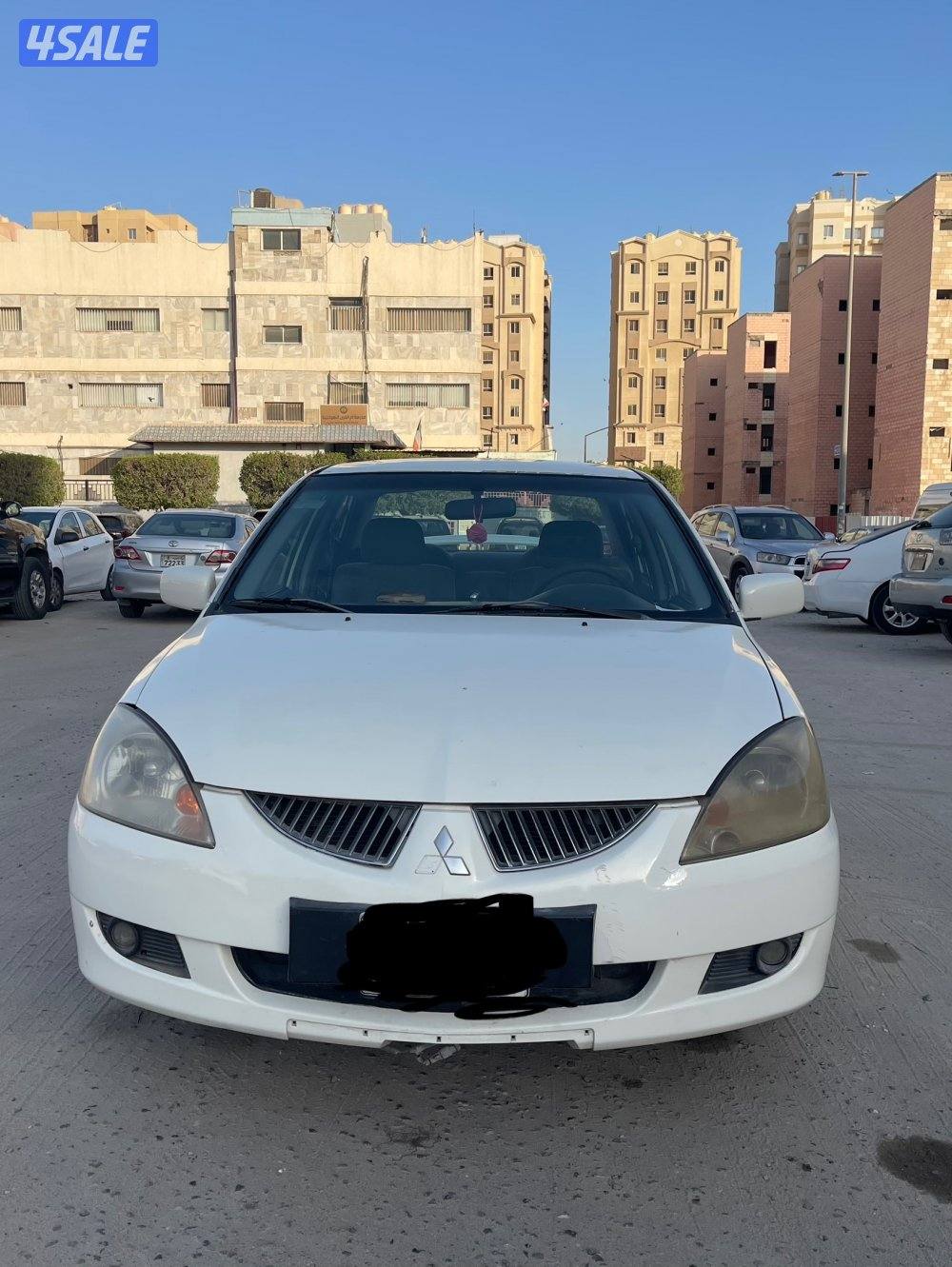 للبيع سيارة ميتسوبيشى لانسر 2004 لون ابيض5