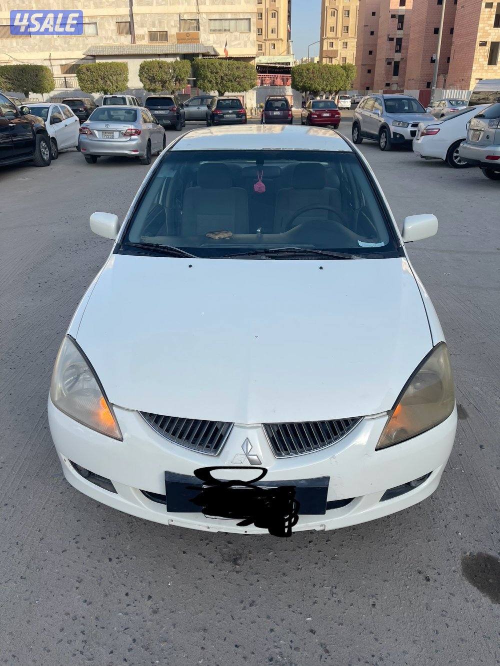 للبيع سيارة ميتسوبيشى لانسر 2004 لون ابيض7