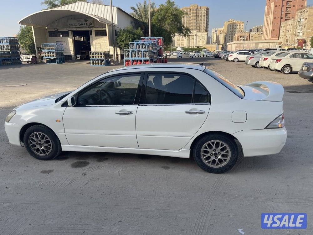 للبيع سيارة ميتسوبيشى لانسر 2004 لون ابيض10