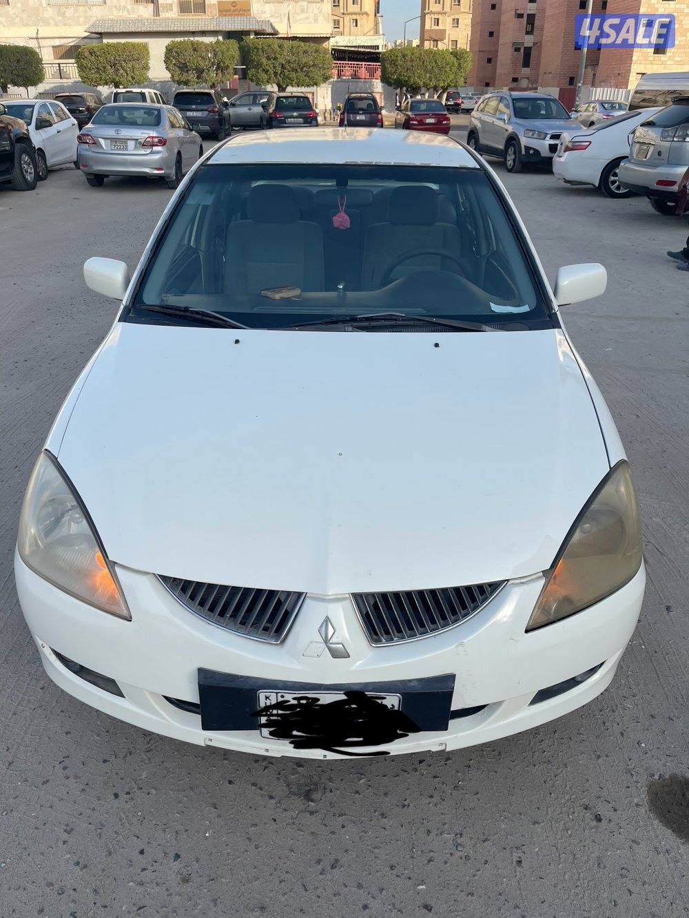 للبيع سيارة ميتسوبيشى لانسر 2004 لون ابيض14