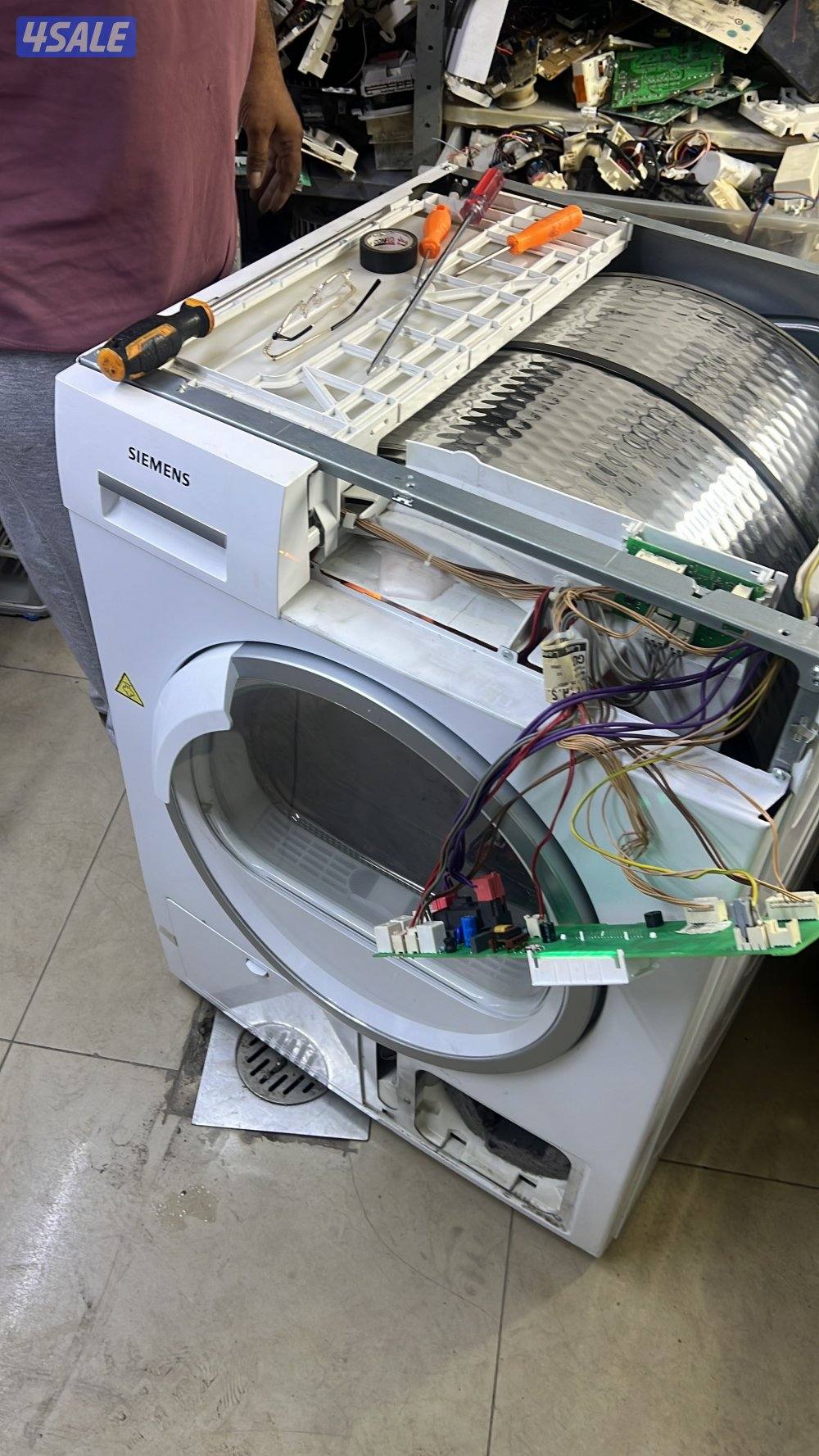 تصليح غسالة ونشافة مع ضمان  فني باكستاني خدمة ٢٤/٧1