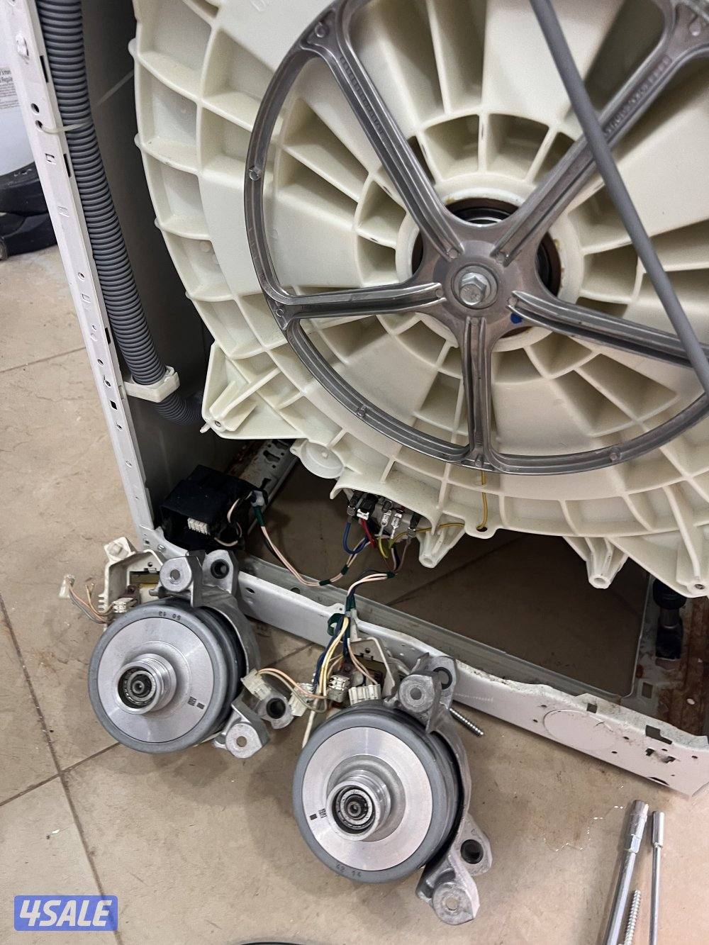 تصليح غسالة ونشافة مع ضمان  فني باكستاني خدمة ٢٤/٧7