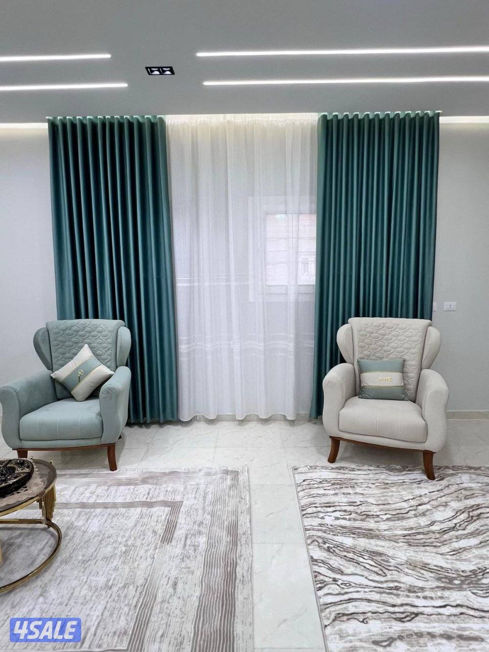 مشغل متخصص في تفصال الستائر الويفي0