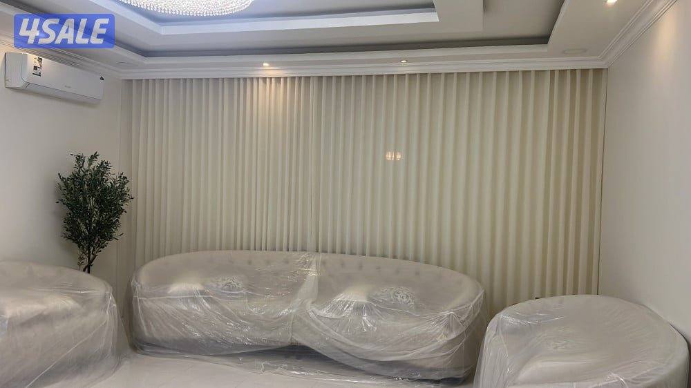 مشغل متخصص في تفصال الستائر الويفي2