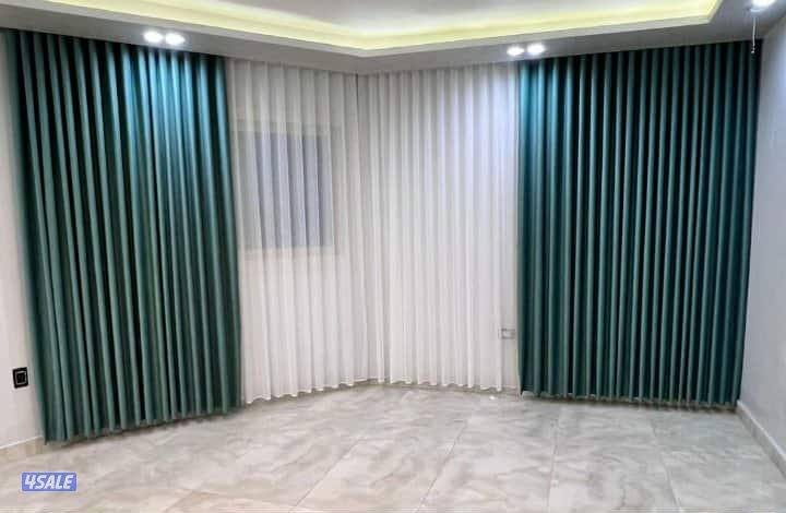 مشغل متخصص في تفصال الستائر الويفي1