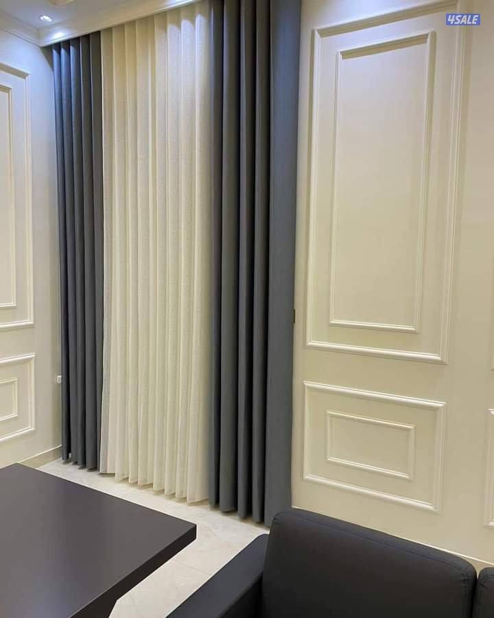 مشغل متخصص في تفصال الستائر الويفي10