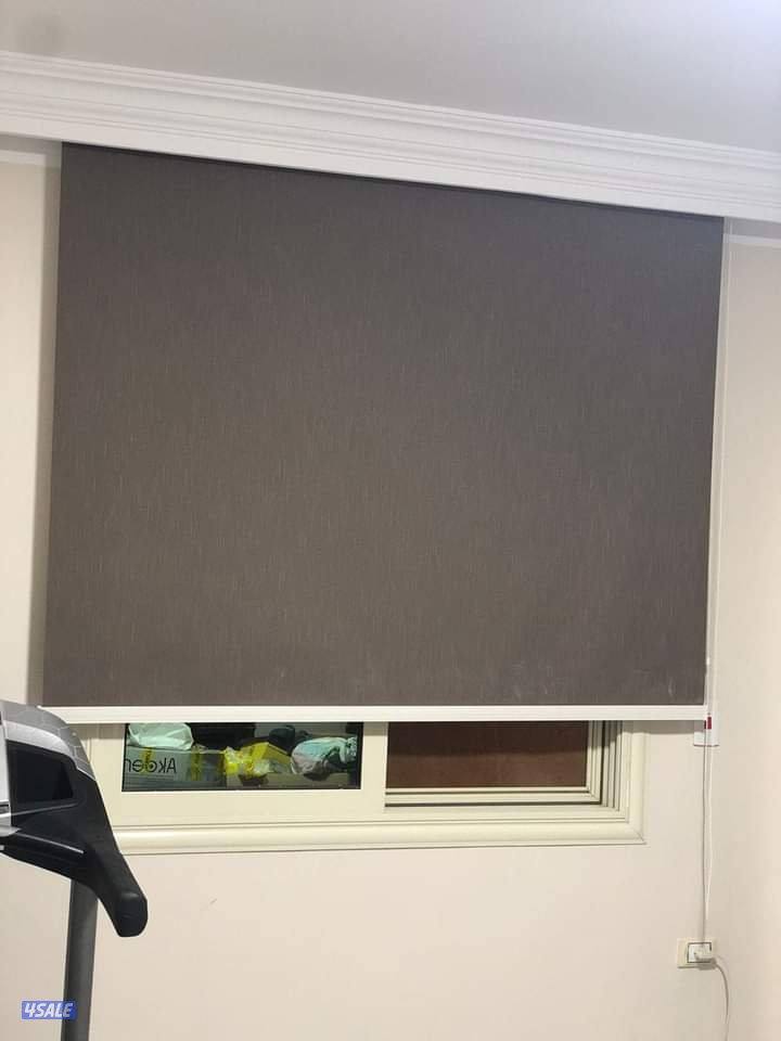 مشغل متخصص في تفصال الستائر الويفي15