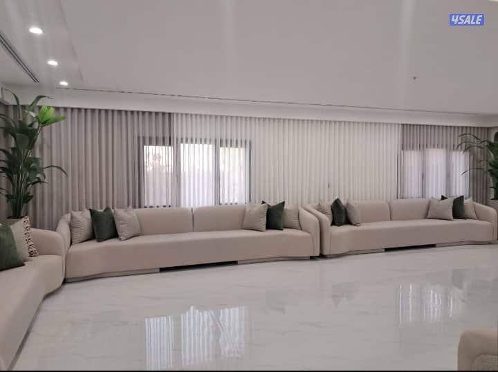 مشغل متخصص في تفصال ستائر1