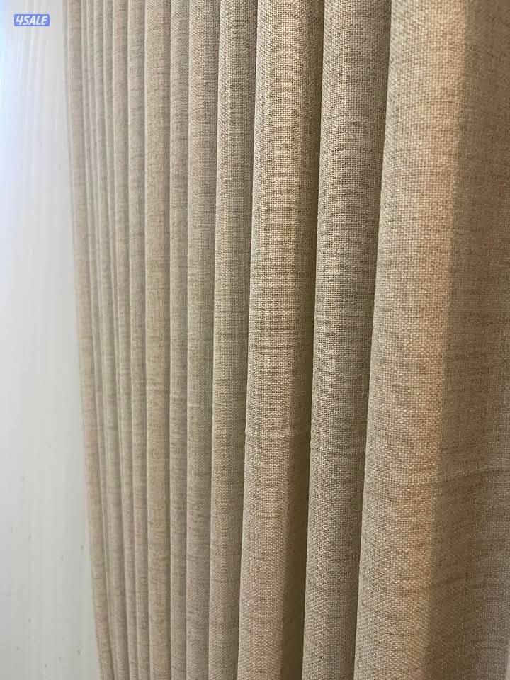 مشغل متخصص في تفصال ستائر4