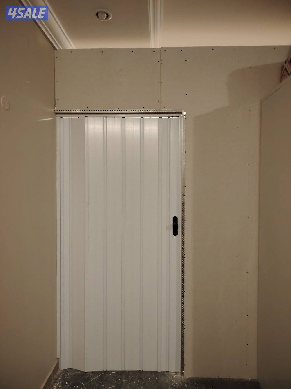 جبس بورد مع باب سحاب كرتيوان وأبواب خشب ديكورات6