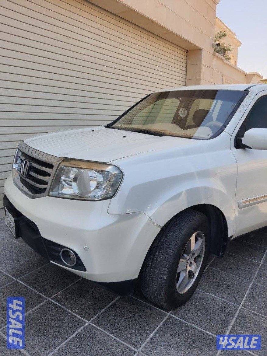 بايلوت 2013 ماشي200000كم بحالة جيدة سرفيس الغانم شرط الفحص2