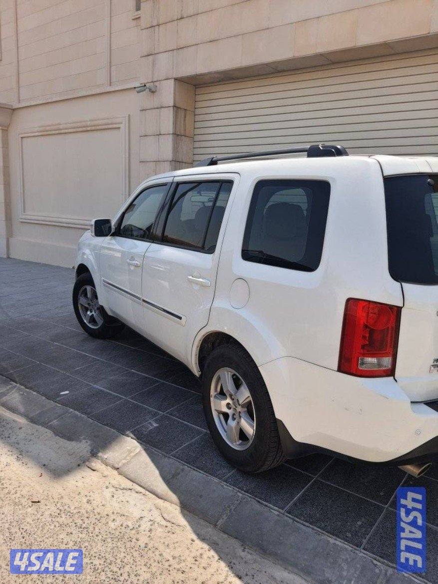 بايلوت 2013 ماشي200000كم بحالة جيدة سرفيس الغانم شرط الفحص1