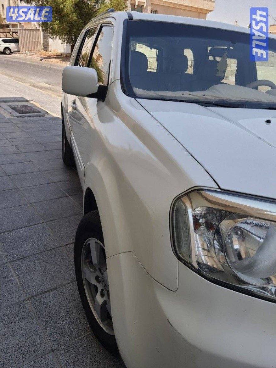 بايلوت 2013 ماشي200000كم بحالة جيدة سرفيس الغانم شرط الفحص3