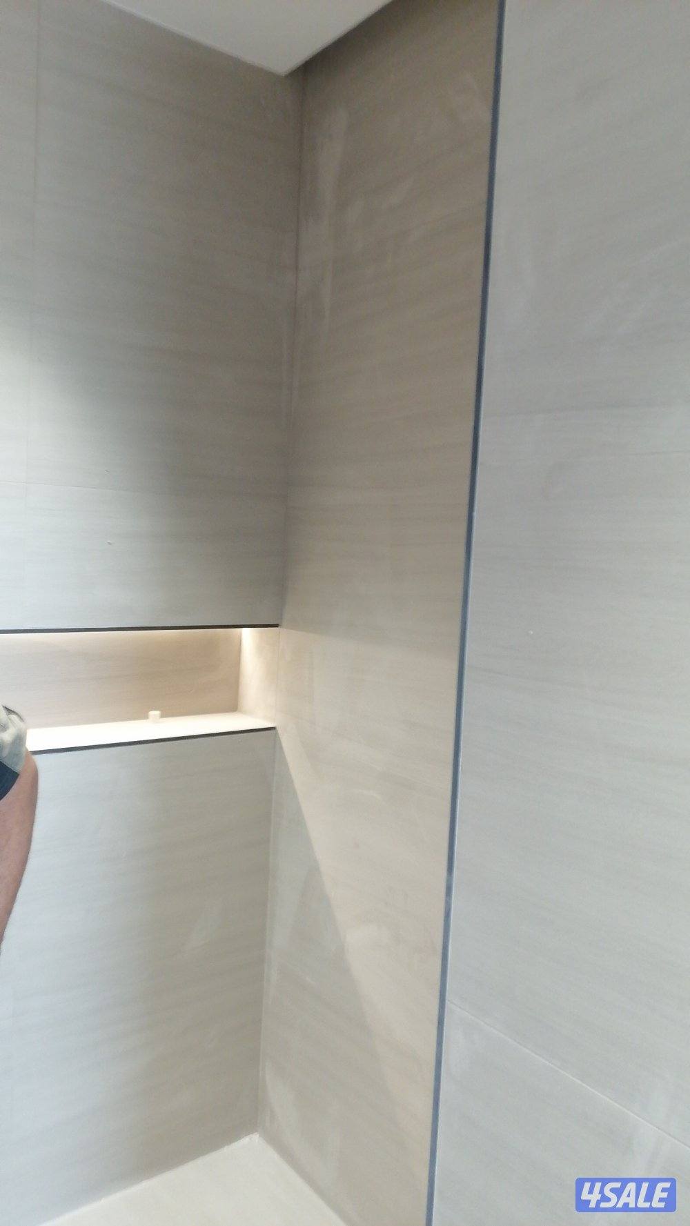 معلم  سراميك معلم بورسلان تركيب حمامات تركيب مطابخ تكسير او تركيب فوق0