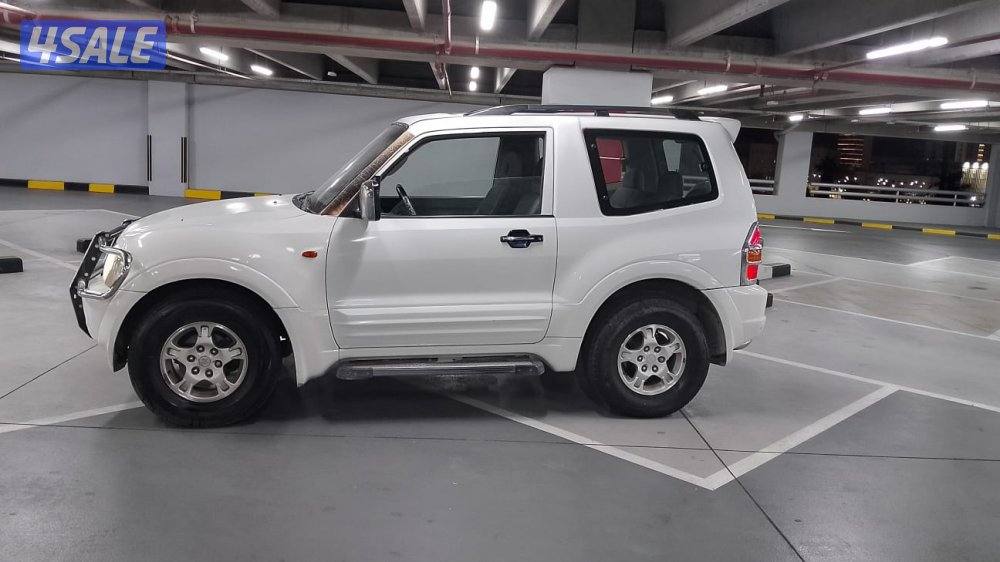 باجيرو ربع بحاله جيده ٢٠٠٢0