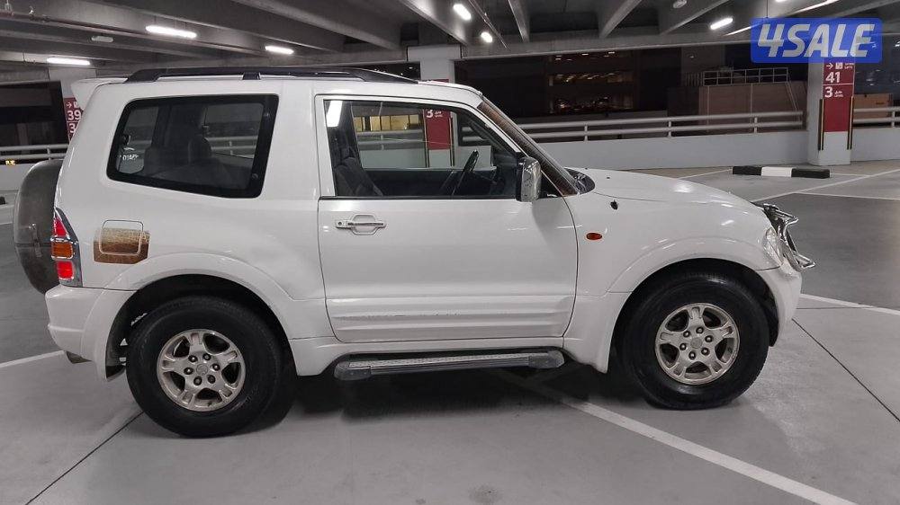 باجيرو ربع بحاله جيده ٢٠٠٢7