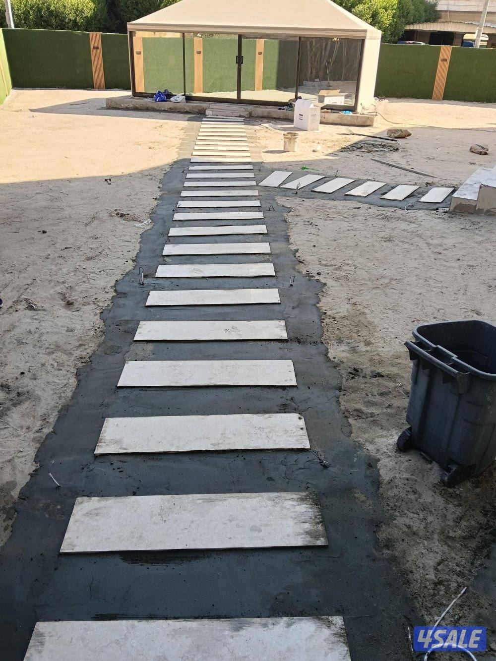 تنسيق حدائق وأسوار تيل طبيعى وصناعى وتركيب الانتر لوك والكيربستون والم5