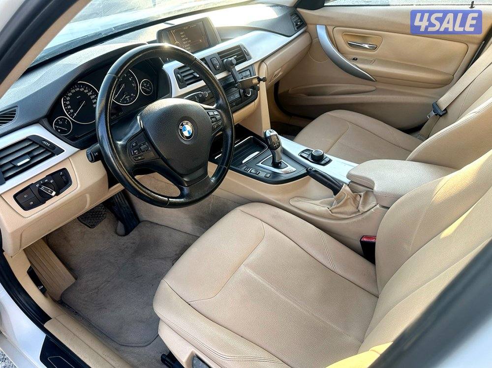 BMW 320i موديل 2012 ماشي 89الف فقط6
