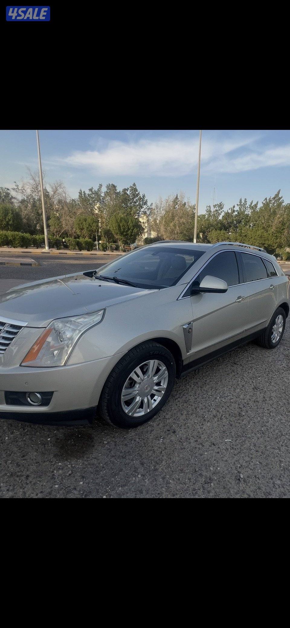 كاديلاك جيب STX  موديل 2013 بحاله ممتازه1