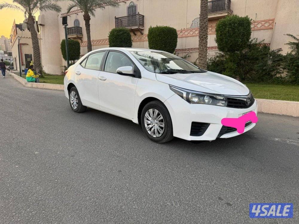 للبيع كرولا  2015! شرط الفحص ماكينه وجير وشاصي14