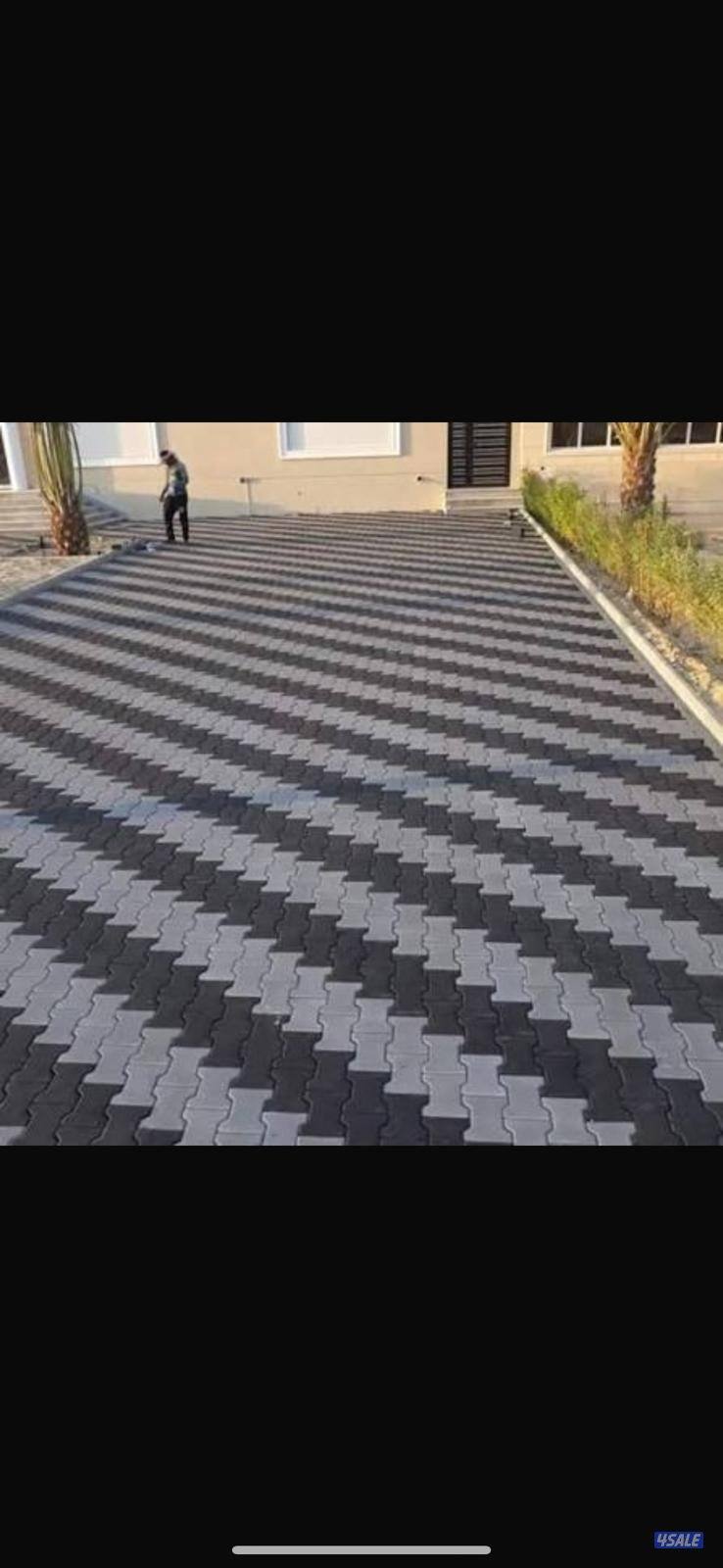 معلم بلاط متداخل وتنسيق حدائق2