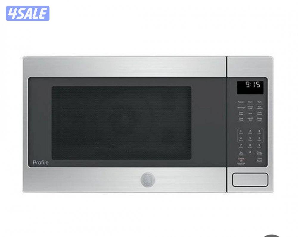 ميكرويف مع فرن و شواية ماركة جنرال اليكتريك حجم ٤٢ لترجديد تماما للبيع0