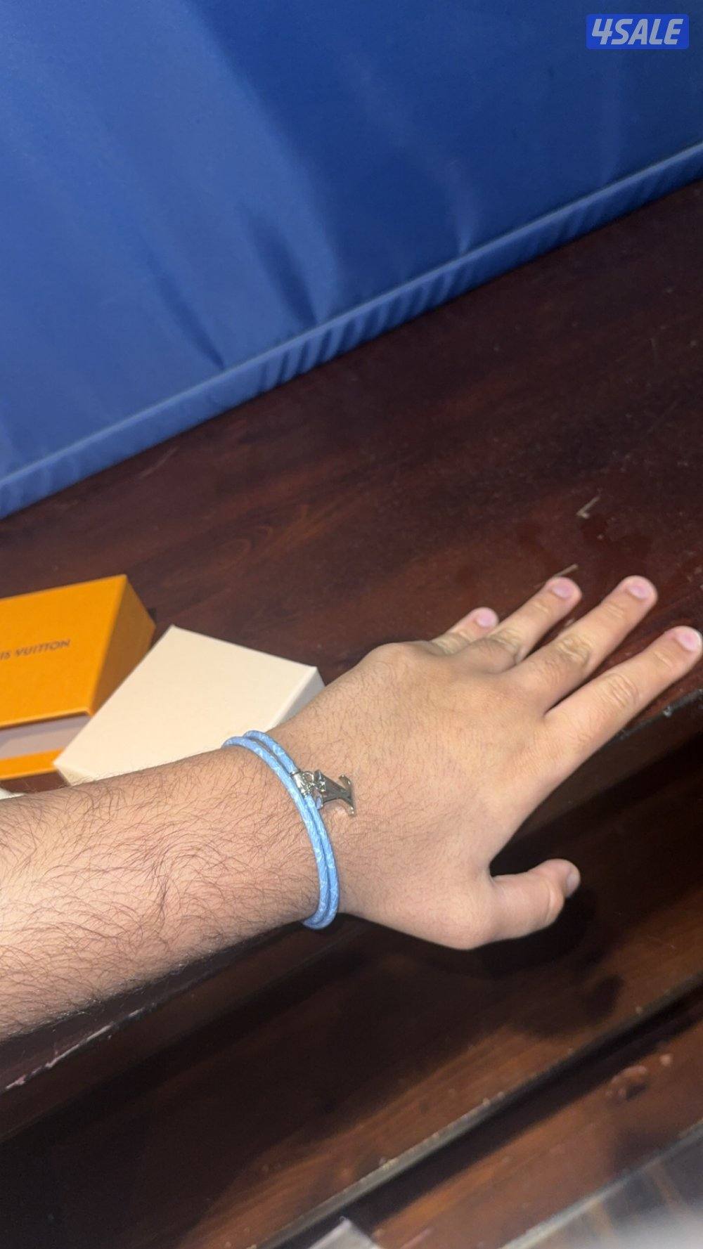 LV braclet brought from dubai boutique worn 3 times has box and bill0