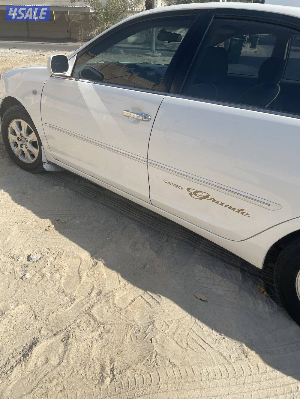 كامري موديل ٢٠٠٣الون ابيض  شرط الفحص جير ومكينه وبدي فيه اصباغ1