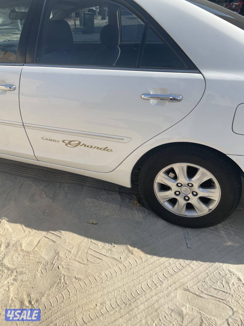 كامري موديل ٢٠٠٣الون ابيض  شرط الفحص جير ومكينه وبدي فيه اصباغ3