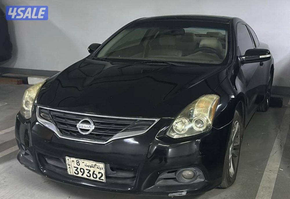 نبسان كوبيه التيما موديل ٢٠١٠ باب واحد ماشية ٢٧٠ الف0