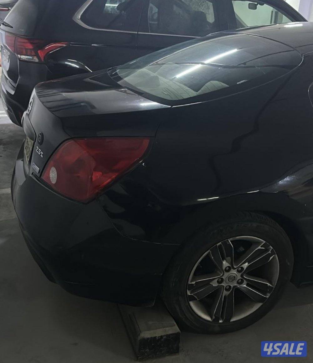 نبسان كوبيه التيما موديل ٢٠١٠ باب واحد ماشية ٢٧٠ الف2