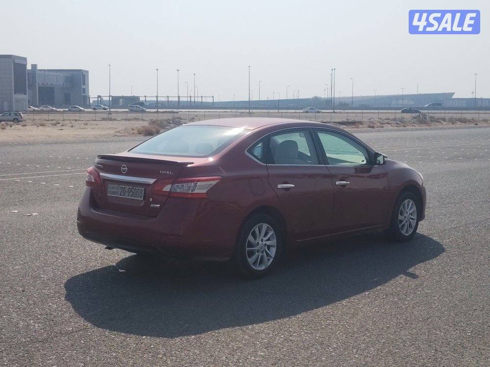 نيسان سنترا موديل٢٠١٣ عنابي عداد ٢١٤ الف بحاله ممتازة2